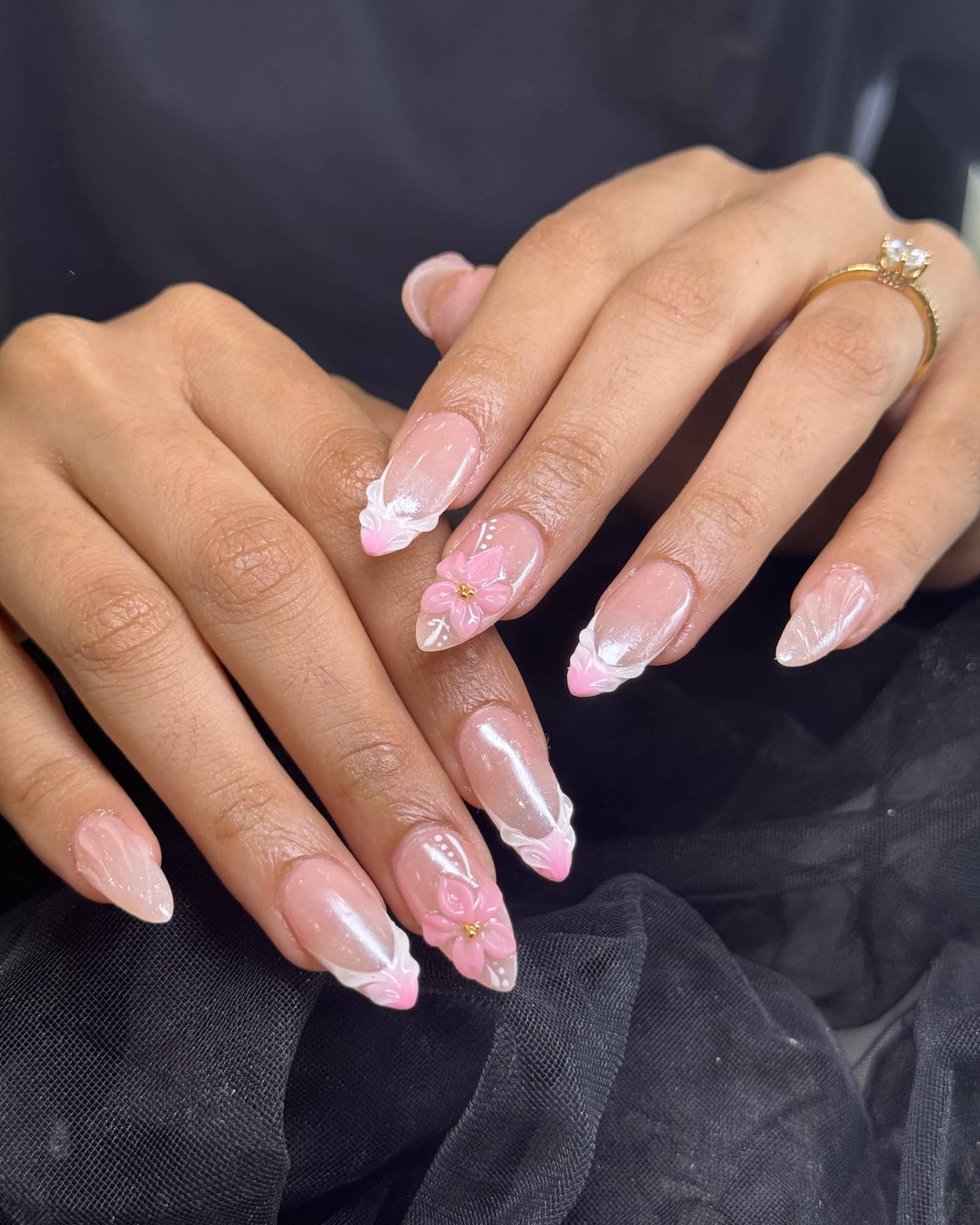 Pink French tips with hand-painted 3D flowers
