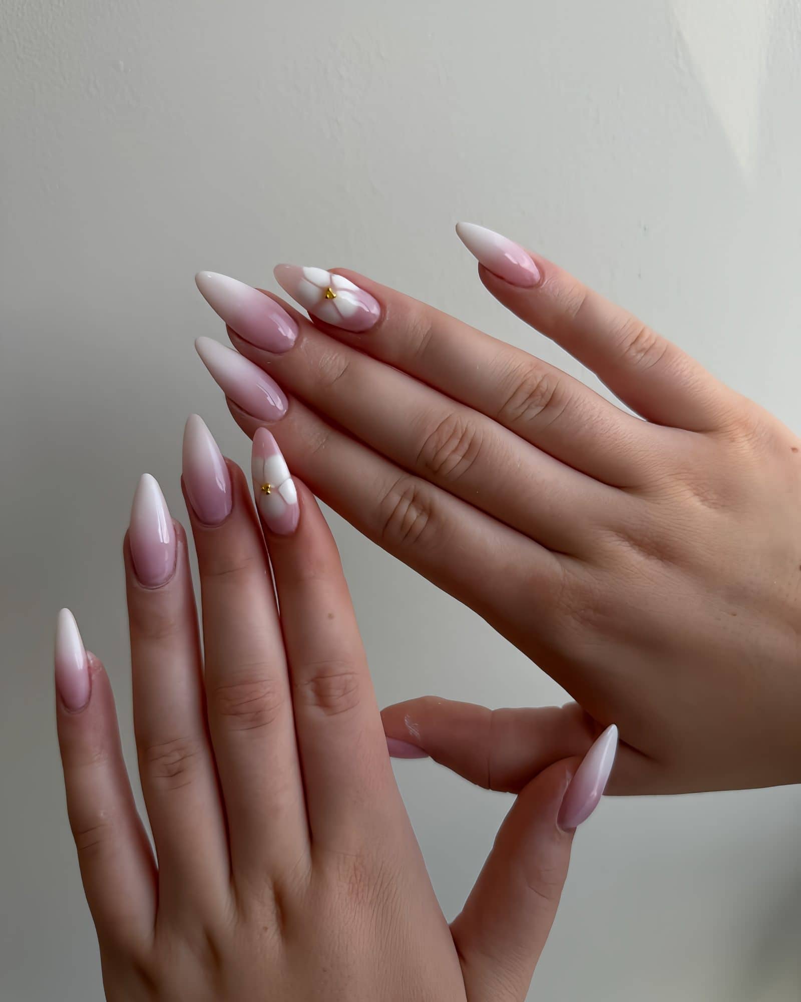 Long nude almond nails, freshly shaped and filed