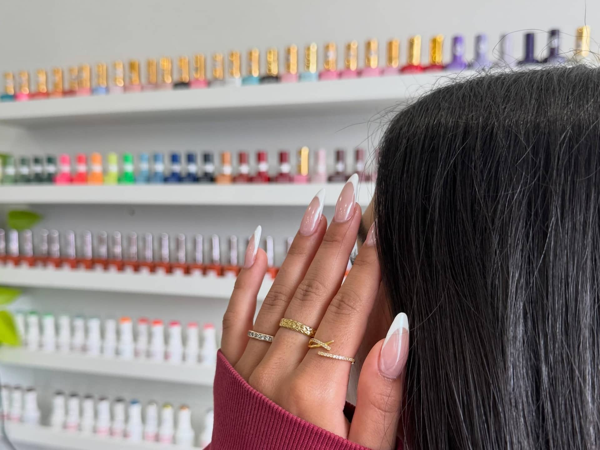 Shelves of gel polish inside Em Nail Studio, Oakville